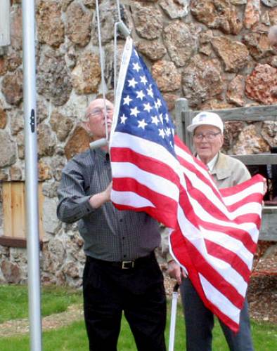 61 Flag Raising - Photo by Ginnie Duffield, Autogram Sentinel