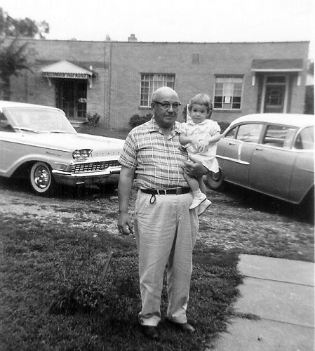 24 Leonard in front of Store with Granddaughter Lisa