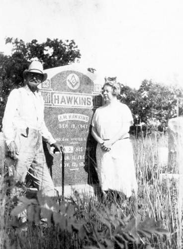 44 James Hawkins and daughter Nancy at tombstone before he died