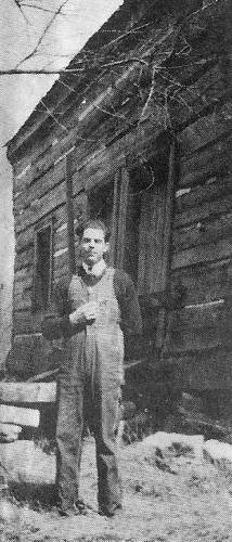 20 Earl in front of Boyhood Home - 1930