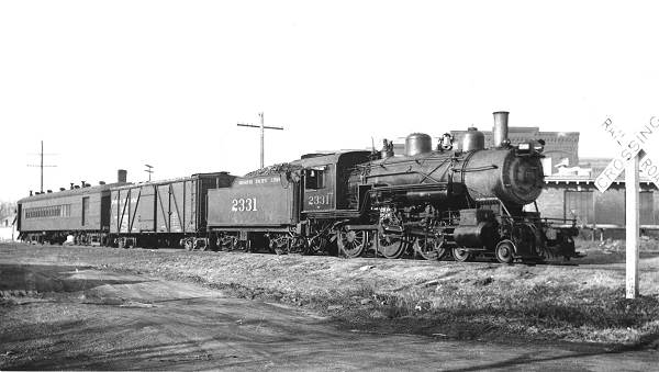 42 Missouri Pacific Engine and Cars at Depot in Eldon