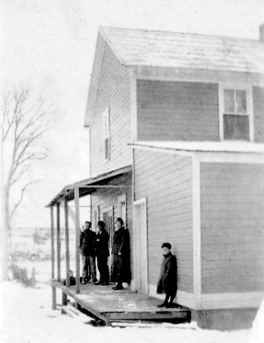 18 Cross Roads Store - James Albert and Grace and Unknown on Porch - Leslie Hannah at End