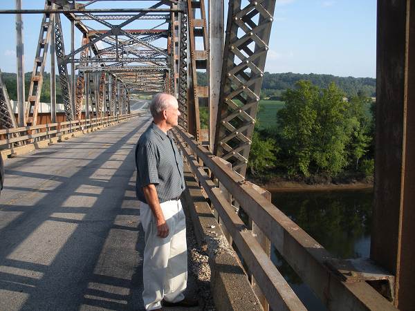 83 Joe looking down river at Last Crossing of Tuscumbia Bridge