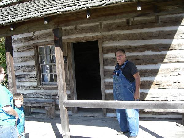 113 Gary Flaugher on porch of his Boyhood Home