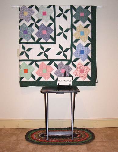 37 Hand crafted quilt and rag rug donated by Elva Steen for Annual Raffle