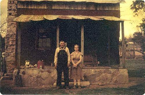 68 Willard and Maggie Boyd in front of Lupardus Cabin