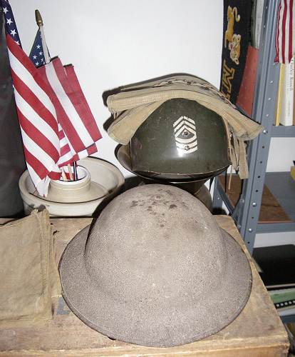 26 Top: Helmet worn by Dick in WWII - Bottom: Worn by Matt in WWI