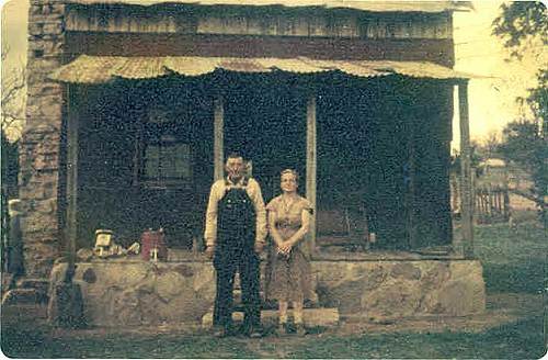20 Willard and Maggie Boyd in front of Lupardus Cabin