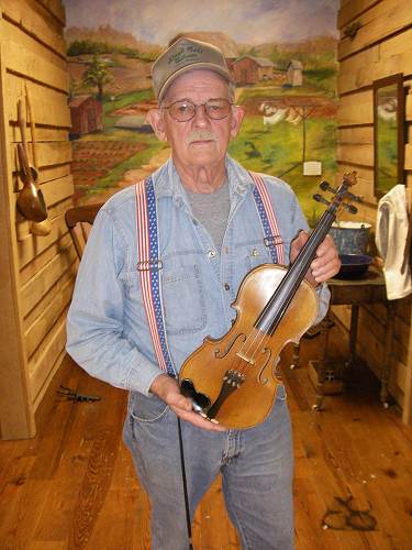 39 Harold Flaugher with father Elmer's Fiddle