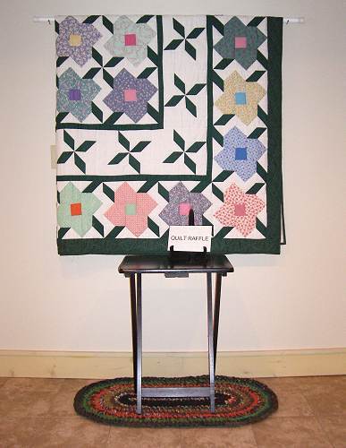 38c Hand Crafted Quilt and Rag Rug donated by Elva Steen for Annual Raffle