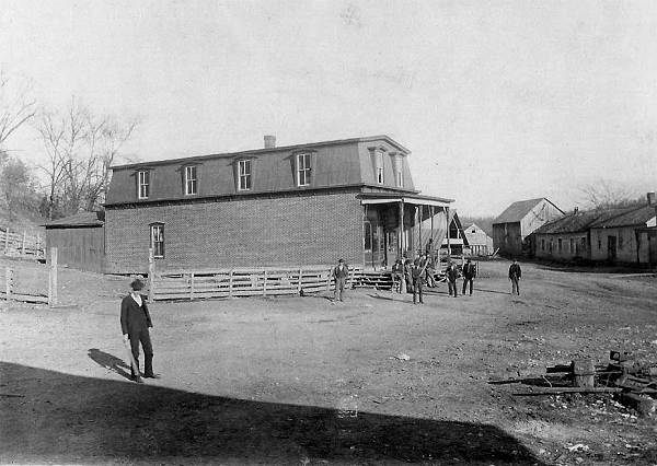 34 Tuscumbia Main Street - Late 1800's - George Swanson in Foreground