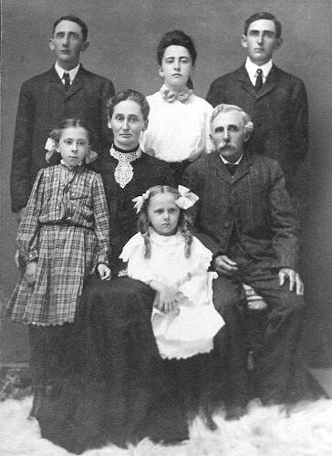 17a Isaiah and Marha Jane Mosley Bunker with Byron, Arie, Milton - Back Row: Ethel, Marha, Isaiah, Ellen - 1906