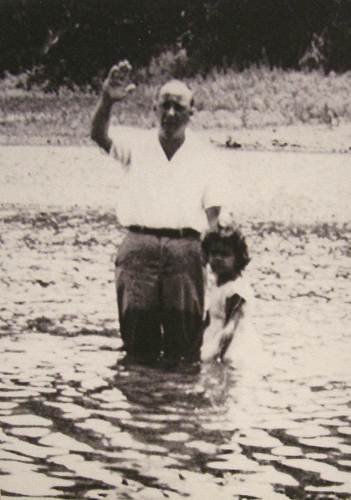25 Robert Todd baptizing daughter Kathy in Osage River