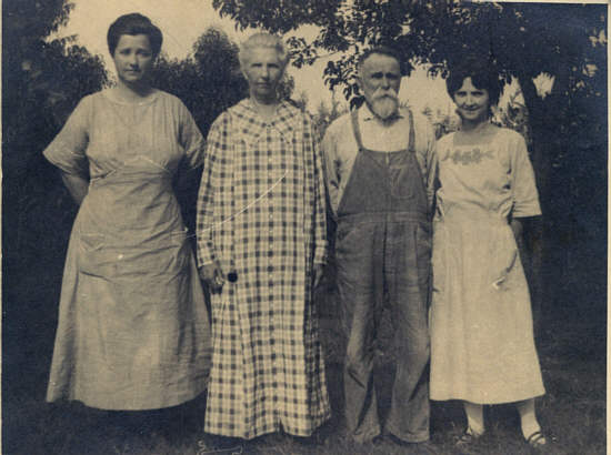 (Nancy) Meckie Van Hooser, Nancy Ann (Russell) and John M. Van Hooser. The younger woman is thought to be a granddaughter, Grace M. Van Hooser.