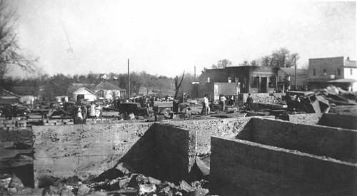  The front foundation is what remained of Loren Atwells home.  The old truck at the back of the building also burnedthe mans wife got excited and couldnt find the keys to the truck.  The foundation at left is what remained of the residence of Lee Atwell. 