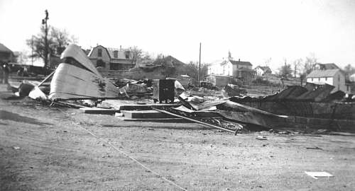 Main Street—Adams & Casey Store with their safe on the front porch. The white house at extreme right was the home of Josephine Shockley Blankenship.