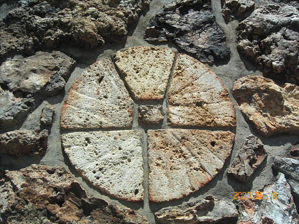 12 mill stone in building wall