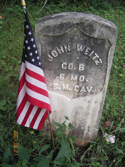  33 John Weitz tombstone 