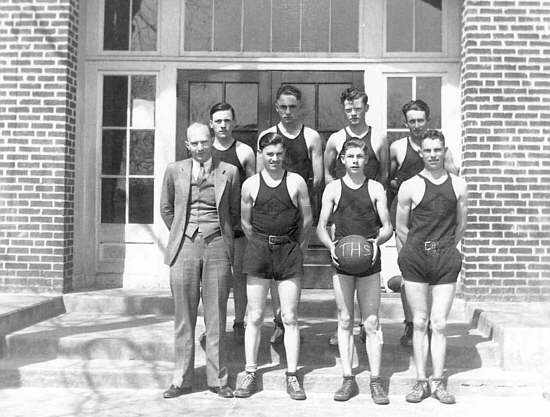 04 front: coach homer c wright , gene templeton, bill hall, alva vaughan, rear: david bear, otis nixdorf, joe wichkham, joe lamb