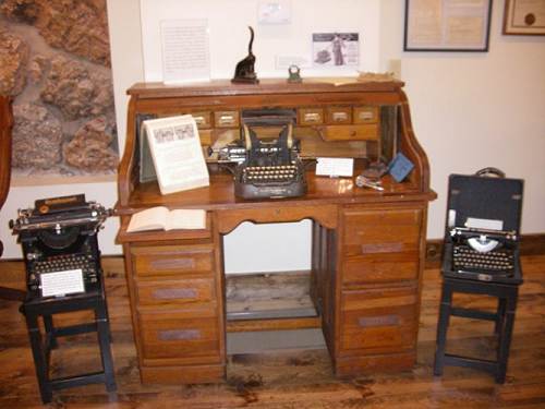 24 Roll Top Desk with Old Typewriters