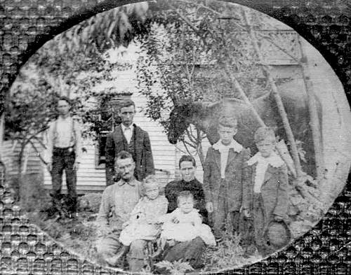 03 James Downing Family - Standing L to R - Andrew Cotten - Dan - Ira - Earl Thompson - Sitting - James Downing - Martha Thompson