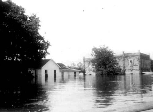 21 Farmer's Exchange and Bear General Store during Flood