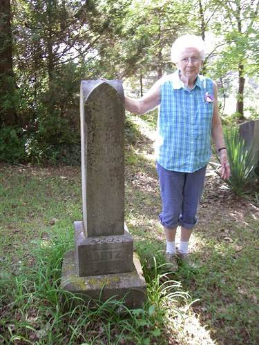 16 Helen at tombstone of John Artz
