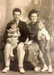 Robert M. and Frances Marjorie (Wright) Schwartz, St. Louis, MO, circa 1940 with their  daughter Joan and Frances's son, Ronald.   Frances (1911-2007) was the youngest child of John and Lillian (Ingam) Wright and a granddaughter of James Lawrence Wright and Elizabeth Mace (Thompson) Wright, early settlers of Miller County, MO on the Little Saline branch, circa 1856.   James built and operated grist and carding mills.  Frances was an artist painting as 'Francesca' in Albuquerque, NM for many years.  She was also an author and poet.   Robert Schwartz (1907-1998) was a graduate of the University of Missouri Law School, circa 1932, and was a WWII Navy veteran and a practicing attorney in NM.  The couple owned and operated a well known restaurant in Albuquerque in the 1940s and 1950s called the 'Wayside Inn.' Robert,  is holding their daughter, Joan (1937-), Miss New Mexico, 1955, and a finalist for the Miss Universe competition.  Ronald 'Ronnie' K.  Schwartz-Wright (1932-2012) was an artist, actor and writer and also a Navy Veteran.