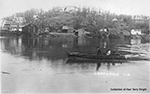 Runabout 'Redwing' piloted by Ernest Fendorf with unknown passenger. Osage River, at Tuscumbia, MO, early 1900s